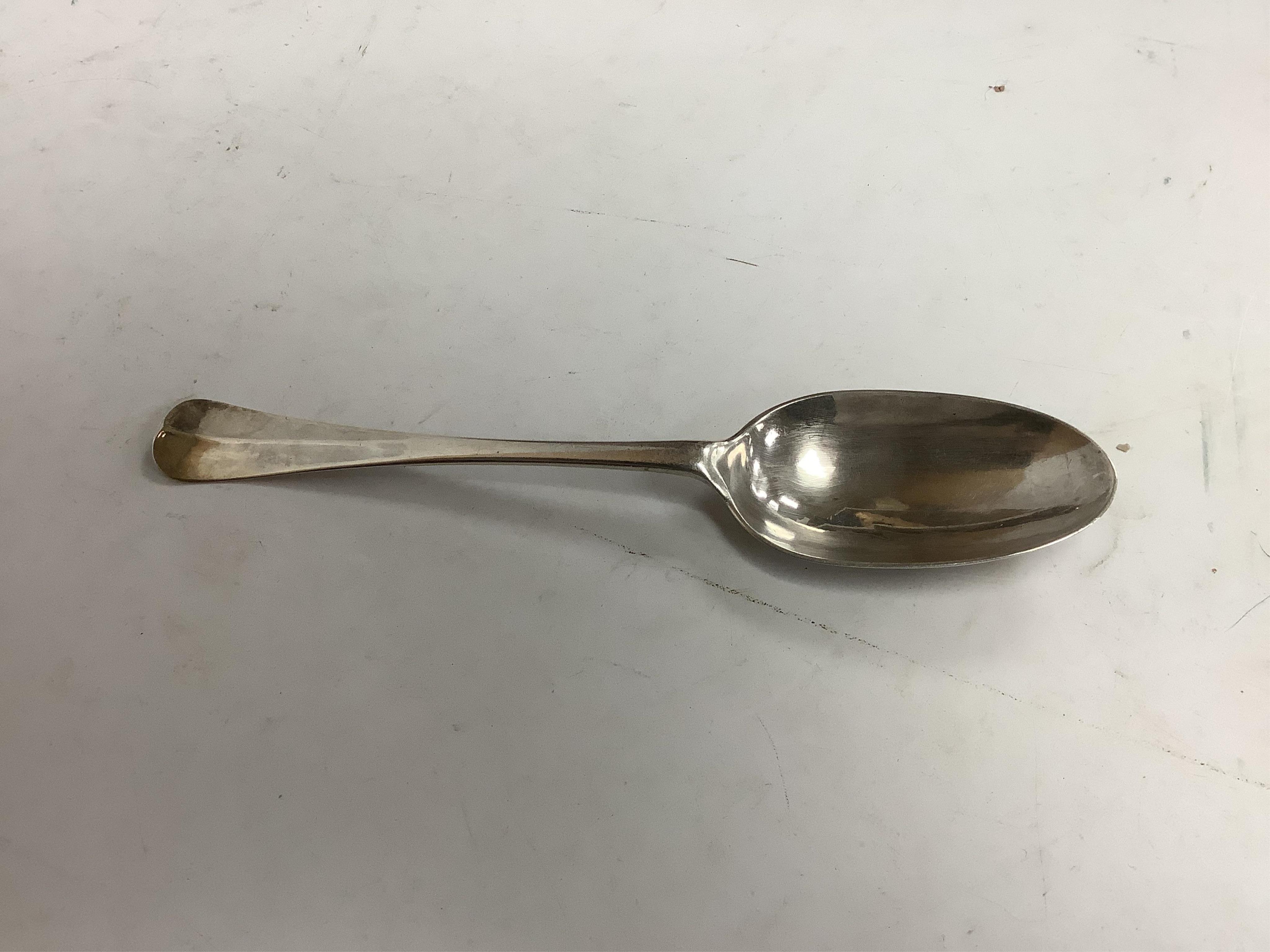 An 18th century Irish? provincial silver Hanoverian pattern tablespoon, maker's mark stamped twice 'I.T with crown above and mullet below' and 'Sterling', 20.9cm, together with eight assorted 18th century silver rat tail